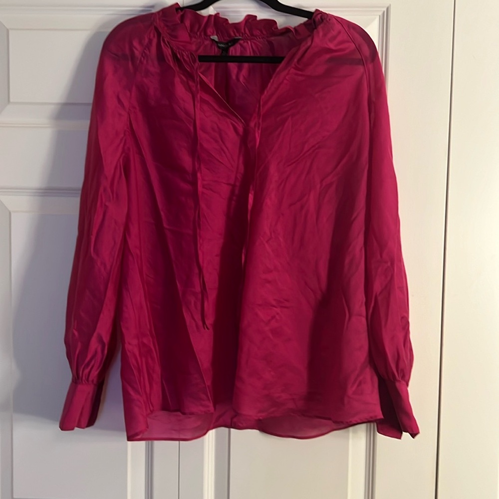 Brand new women's Blouse. Size XL. Excellent condition. Pink color. Ruffle neck